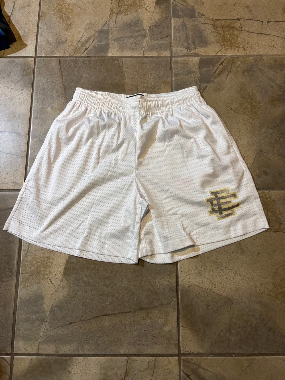 Eric Emanuel white shorts with silver/gold logo